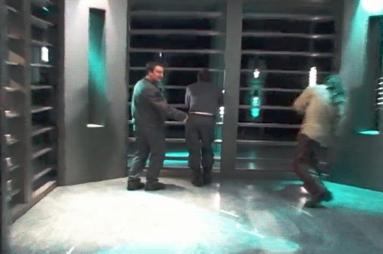 Behind the scenes on Stargate Atlantis, Joe is leaning over a railing on a phone. David comes up behind him and gives his ass two thumbs up. Rachel window wipes his right ass cheek and Jason points to Joes exposed boxers and gestures the camera closer while David illustrates the curvature of Joes left cheek. Joe remains oblivious.